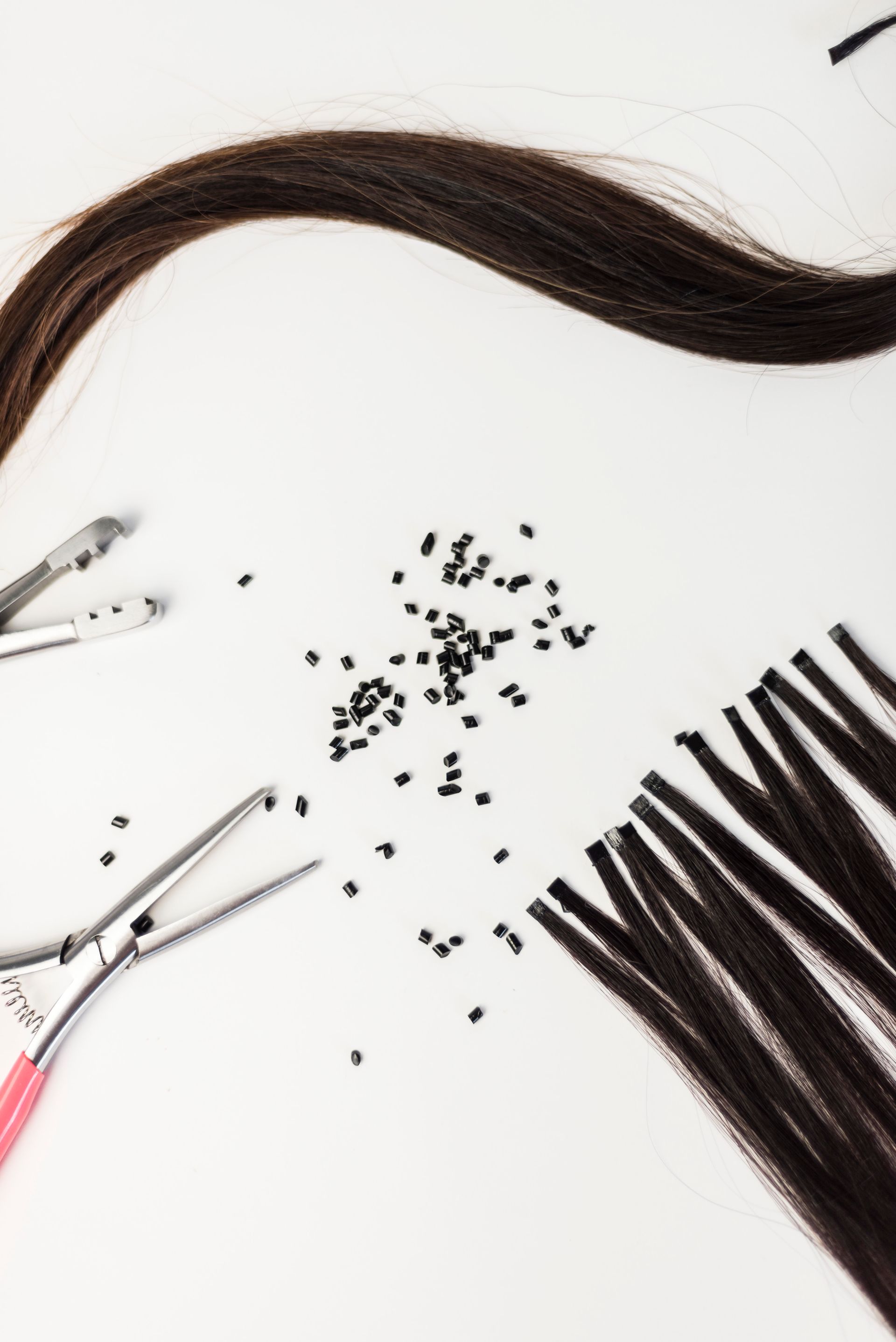 Détail technique d'extensions artisanales faites main pour un rendu invisible